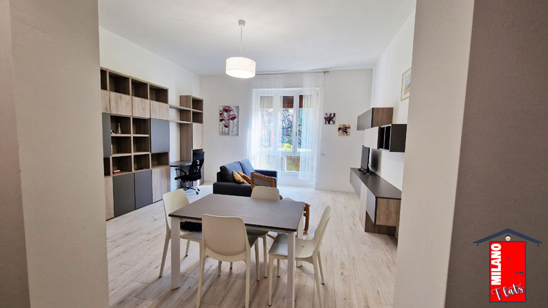 1001soggiorno-divano-tv-angolo-studio-scrivania-affitti-brevi-residenza-fontanile-milano-due-segrate-mi