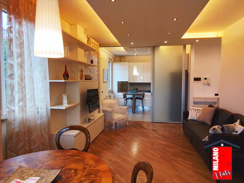 853salotto-divano-letto-tv-tavolo-pranzo-appartamento-via-golinelli-segrate-mi